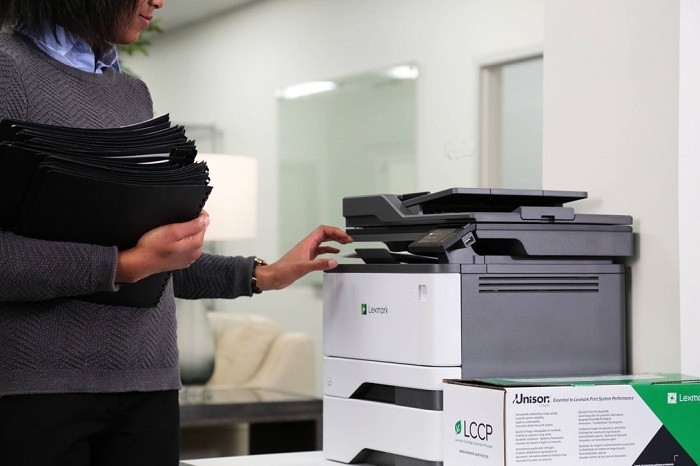 employee-using-lexmark-printer