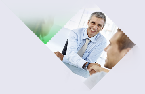 man shaking hands with group of people