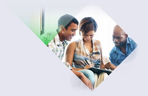 man and woman reviewing paperwork with agent
